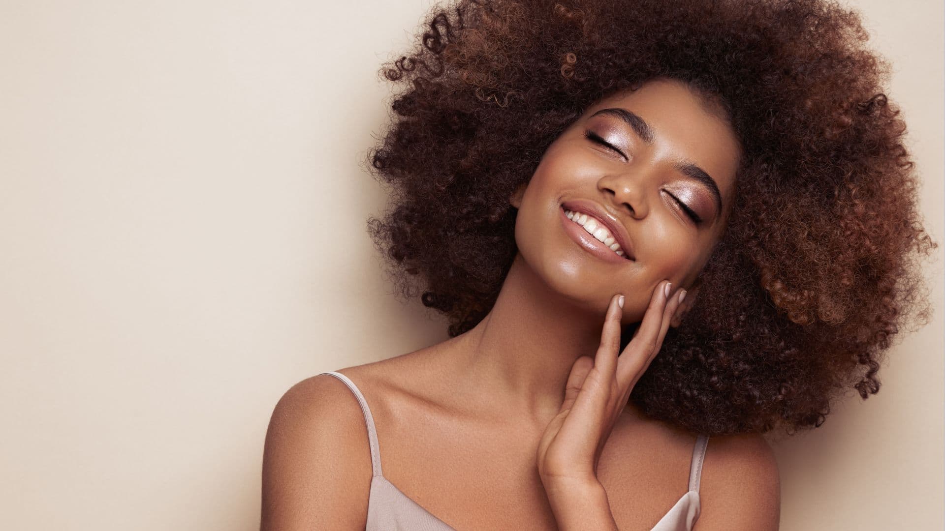 Woman smiling eyes closed