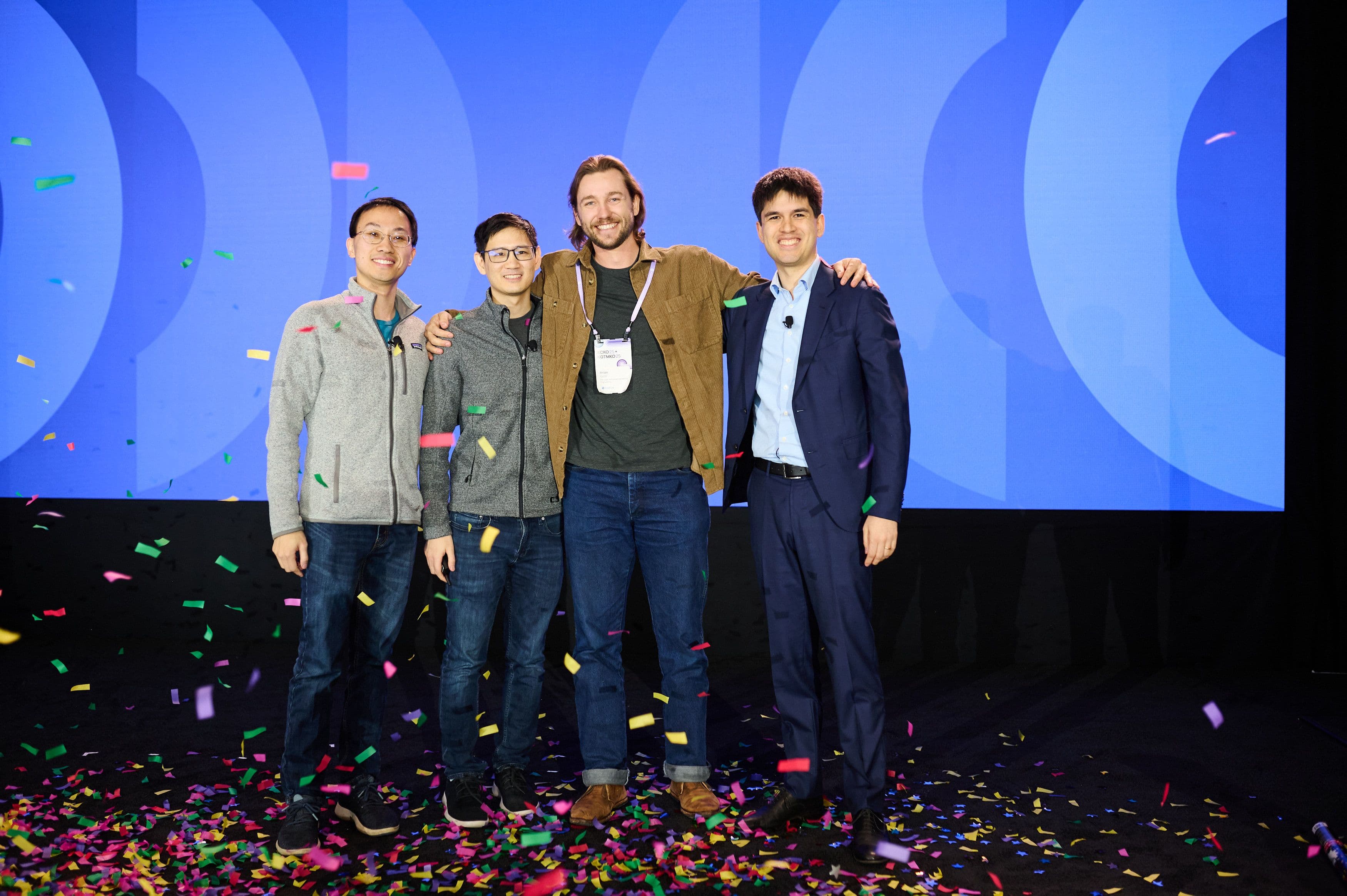 Brian Giori smiles with Amplitude cofounders Jeffrey Wang, Curtis Liu, and Spenser Skates